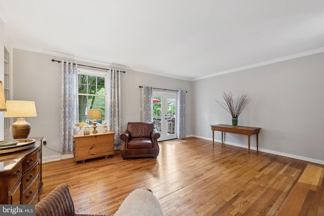 121 Harrison St NE, Leesburg, VA 20176 - living area featuring light wood-style flooring and crown molding