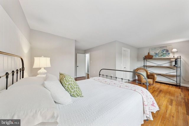 121 Harrison St NE, Leesburg, VA 20176 - bedroom featuring baseboards and wood finished floors