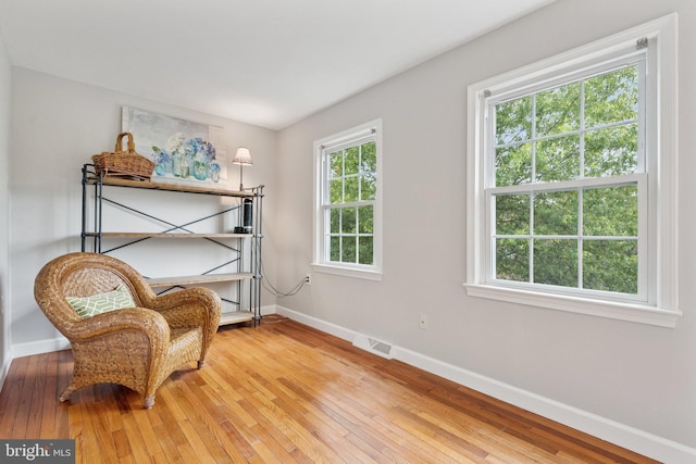 121 Harrison St NE, Leesburg, VA 20176 - living area featuring light wood-style flooring