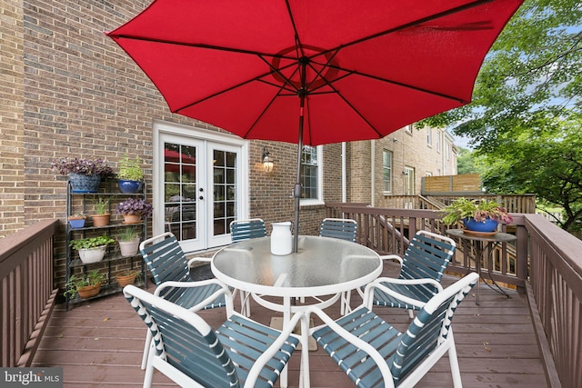 121 Harrison St NE, Leesburg, VA 20176 - wooden deck with french doors and outdoor dining space