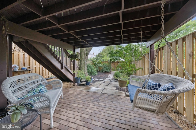 121 Harrison St NE, Leesburg, VA 20176 - wooden deck featuring stairs, a patio, and a fenced backyard