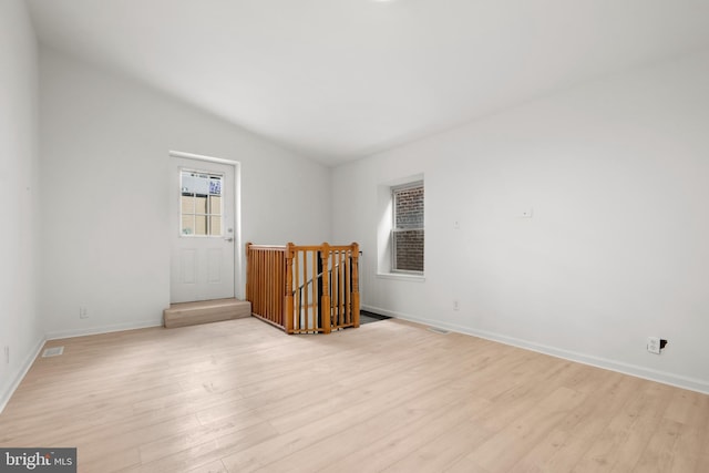 1805 Chestnut St, Philadelphia, PA 19103 - unfurnished room with vaulted ceiling and light wood finished floors