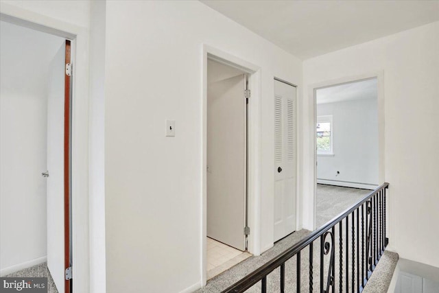 306 Walnut Rdg, Pottstown, PA 19464 - hallway with carpet flooring and a baseboard heating unit