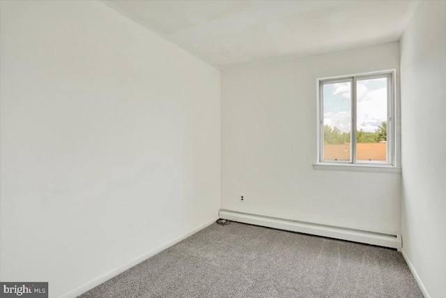 306 Walnut Rdg, Pottstown, PA 19464 - carpeted empty room featuring a baseboard heating unit and baseboards
