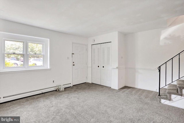 306 Walnut Rdg, Pottstown, PA 19464 - foyer entrance featuring baseboard heating, carpet flooring, and stairs