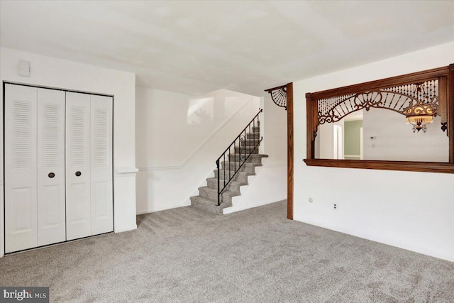 306 Walnut Rdg, Pottstown, PA 19464 - unfurnished living room featuring carpet flooring and stairway