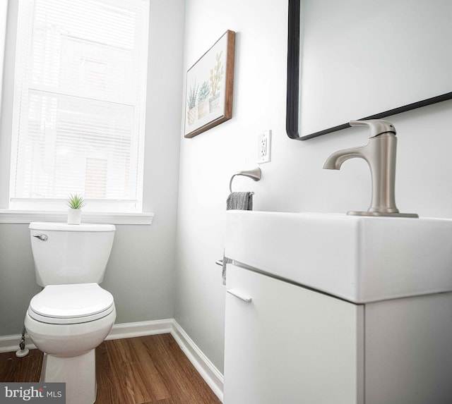 535 N Decker Ave, Baltimore, MD 21205 - bathroom featuring wood finished floors and vanity