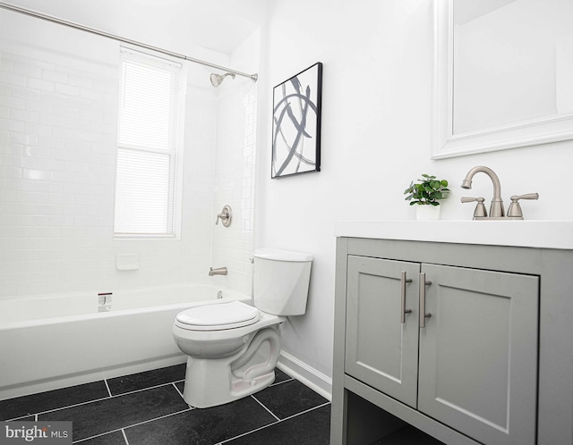 535 N Decker Ave, Baltimore, MD 21205 - full bath with tile patterned flooring, vanity, and bathtub / shower combination