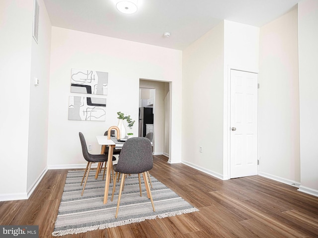 535 N Decker Ave, Baltimore, MD 21205 - dining room with wood finished floors and baseboards