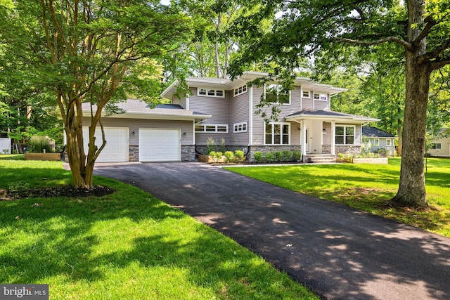 1227 Cross Rd, Annapolis, MD 21403 - prairie-style home featuring stone siding, driveway, a garage, and a front lawn