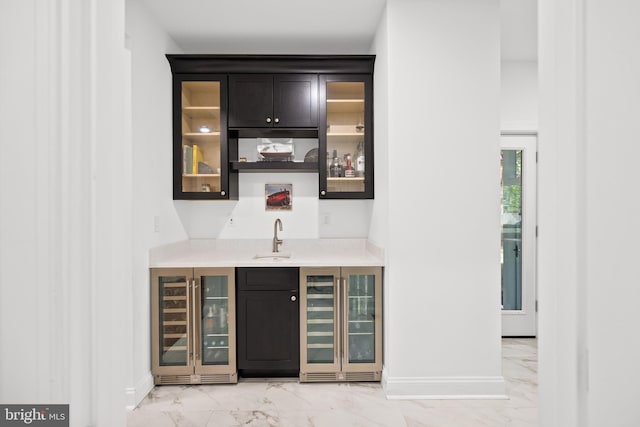 1227 Cross Rd, Annapolis, MD 21403 - indoor wet bar with beverage cooler and light marble finish floors
