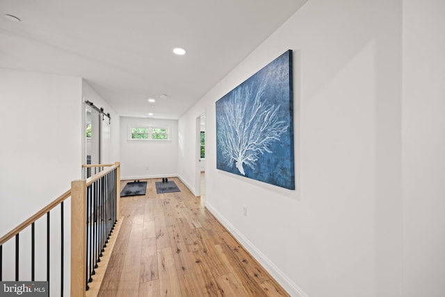 1227 Cross Rd, Annapolis, MD 21403 - hall featuring light wood finished floors, recessed lighting, and a barn door