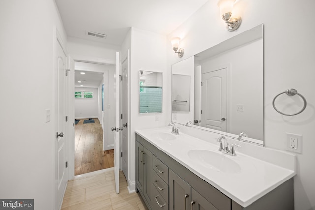 1227 Cross Rd, Annapolis, MD 21403 - full bathroom featuring double vanity and baseboards