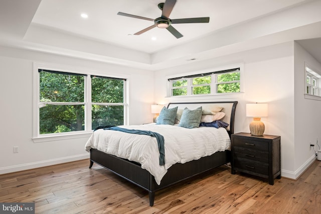 1227 Cross Rd, Annapolis, MD 21403 - bedroom featuring a tray ceiling, wood-type flooring, recessed lighting, and ceiling fan