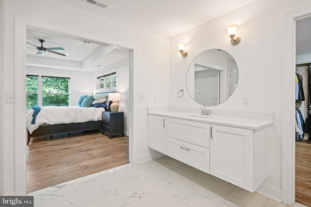1227 Cross Rd, Annapolis, MD 21403 - ensuite bathroom with a ceiling fan, marble look tile flooring, and vanity