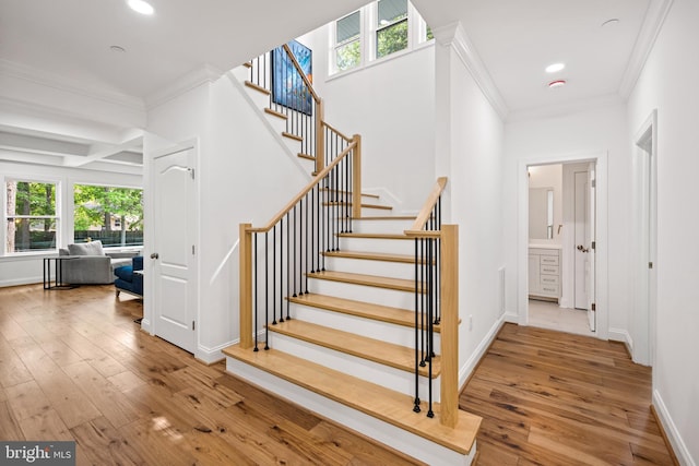 1227 Cross Rd, Annapolis, MD 21403 - stairway with plenty of natural light, wood-type flooring, ornamental molding, recessed lighting, and beamed ceiling