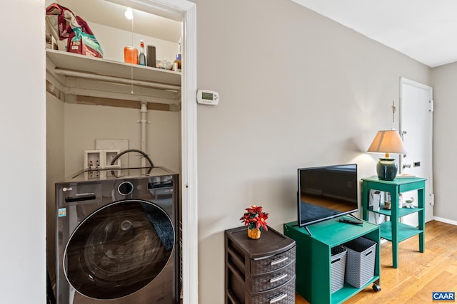 134 Hessian Hills Cir Unit 2, Charlottesville, VA 22901 - laundry room with washer / dryer and wood finished floors