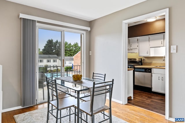 134 Hessian Hills Cir Unit 2, Charlottesville, VA 22901 - dining room featuring light wood-type flooring and baseboards