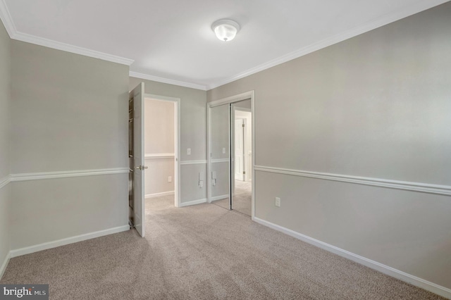 10828 Moore Dr, Manassas, VA 20111 - unfurnished bedroom with ornamental molding, carpet, and a closet