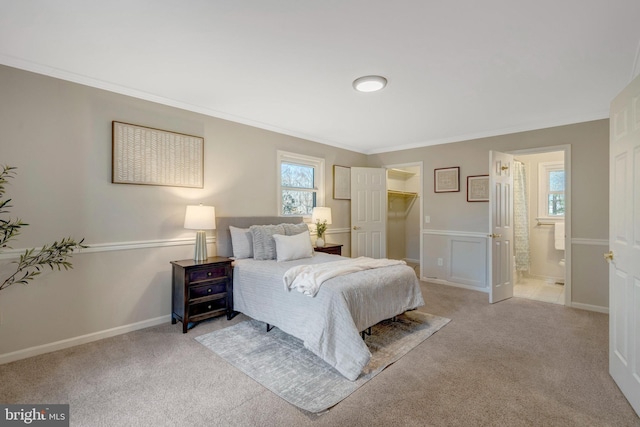 10828 Moore Dr, Manassas, VA 20111 - bedroom with crown molding, carpet floors, a spacious closet, ensuite bath, and a closet