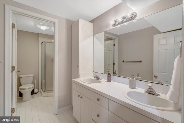 10828 Moore Dr, Manassas, VA 20111 - bathroom featuring a shower stall, tile patterned flooring, and double vanity
