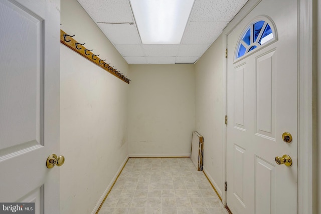 10828 Moore Dr, Manassas, VA 20111 - below grade area with a paneled ceiling and baseboards