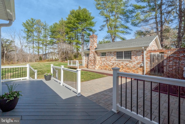 10828 Moore Dr, Manassas, VA 20111 - wooden deck featuring a yard