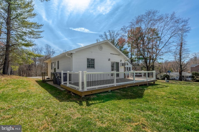 10828 Moore Dr, Manassas, VA 20111 - back of property with a deck and a yard