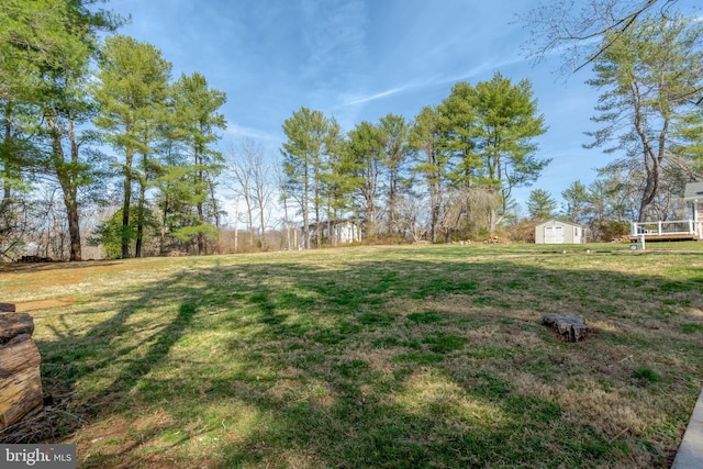 10828 Moore Dr, Manassas, VA 20111 - view of grassy yard with a storage shed