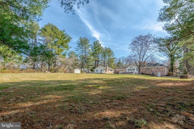 10828 Moore Dr, Manassas, VA 20111 - view of grassy yard with a storage shed
