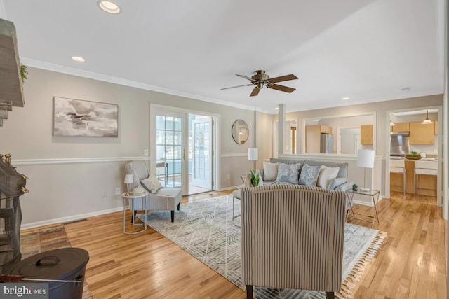 10828 Moore Dr, Manassas, VA 20111 - living room featuring ornamental molding, ceiling fan, light wood-type flooring, and recessed lighting