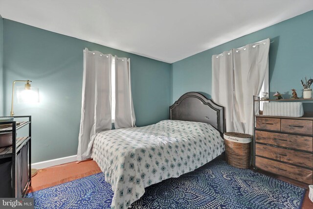 755 W Market St, Orwigsburg, PA 17961 - bedroom with baseboards and wood finished floors