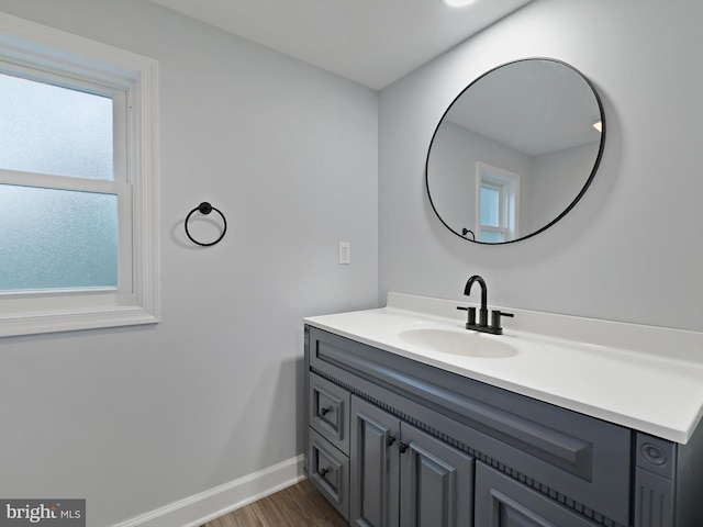 7811 Harbor Rd, Pasadena, MD 21122 - bathroom with vanity and wood finished floors