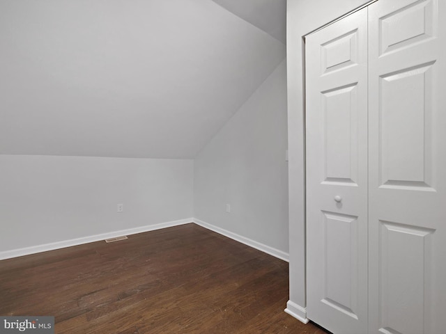 7811 Harbor Rd, Pasadena, MD 21122 - bonus room featuring lofted ceiling and dark wood-style floors