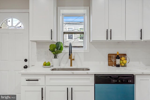 3209 Grayson St, Baltimore, MD 21216 - kitchen with dishwashing machine, white cabinets, decorative backsplash, and healthy amount of natural light