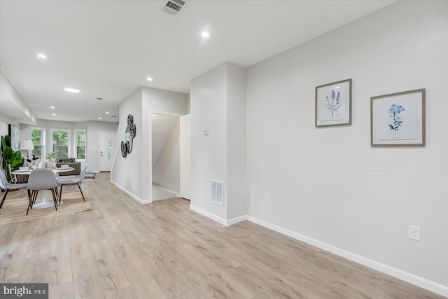 3209 Grayson St, Baltimore, MD 21216 - dining room with light wood-style flooring and recessed lighting
