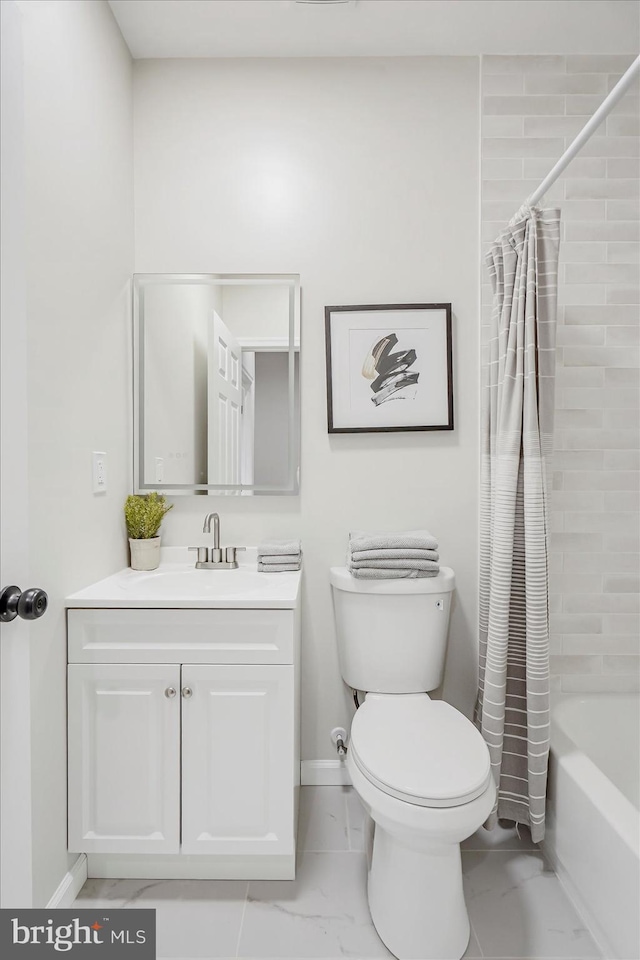 3209 Grayson St, Baltimore, MD 21216 - bathroom with vanity, shower / tub combo, and marble look tiles