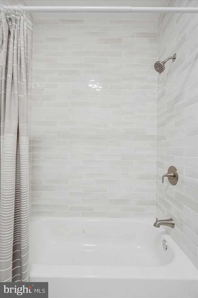 3209 Grayson St, Baltimore, MD 21216 - bathroom featuring shower / bathtub combination with curtain