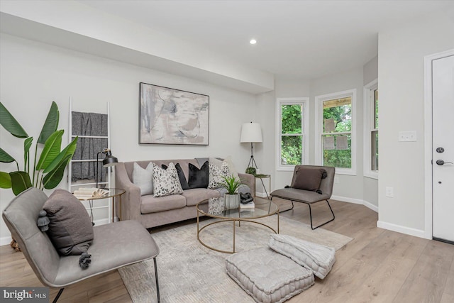 3209 Grayson St, Baltimore, MD 21216 - living room featuring light wood-type flooring and recessed lighting