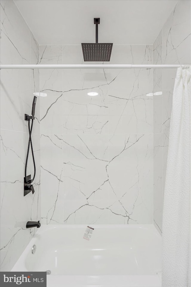 3209 Grayson St, Baltimore, MD 21216 - full bathroom featuring a combined bath / shower with rainfall shower
