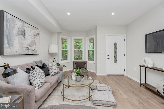 3209 Grayson St, Baltimore, MD 21216 - living area featuring light wood-style floors and recessed lighting