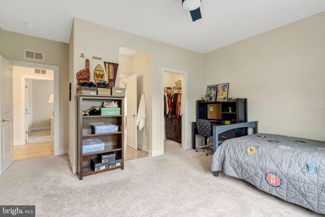 40928 Arcadian Pond Ct, Aldie, VA 20105 - bedroom featuring a walk in closet, carpet, a closet, and a ceiling fan