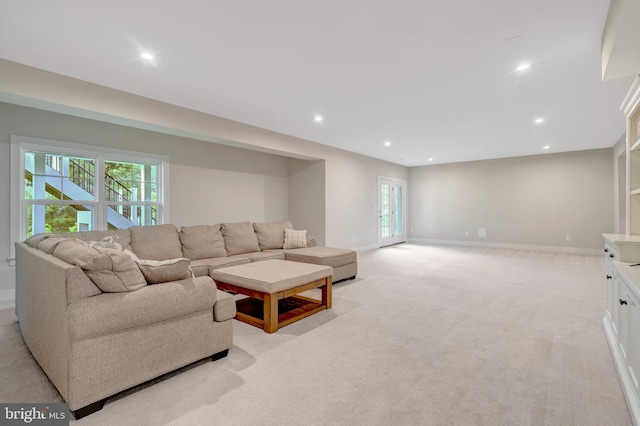 40928 Arcadian Pond Ct, Aldie, VA 20105 - living room featuring light colored carpet, healthy amount of natural light, and recessed lighting