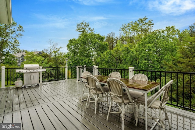40928 Arcadian Pond Ct, Aldie, VA 20105 - wooden terrace featuring outdoor dining area and view of scattered trees