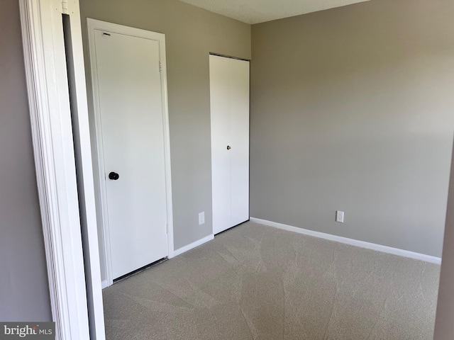 2100 Langston Blvd Unit 406, Arlington, VA 22201 - unfurnished bedroom with carpet flooring and a closet