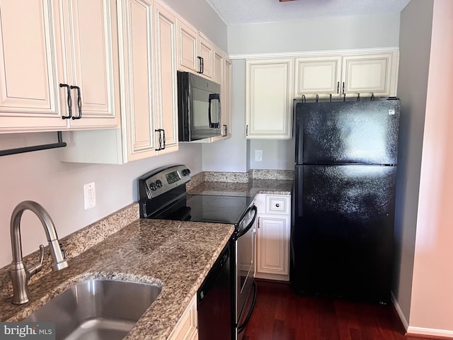 2100 Langston Blvd Unit 406, Arlington, VA 22201 - kitchen featuring black appliances, dark wood finished floors, and stone counters