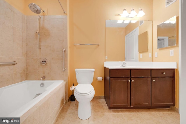 1391 Pennsylvania Ave SE Unit 247, Washington, DC 20003 - bathroom featuring vanity, tiled shower / bath, and tile patterned flooring