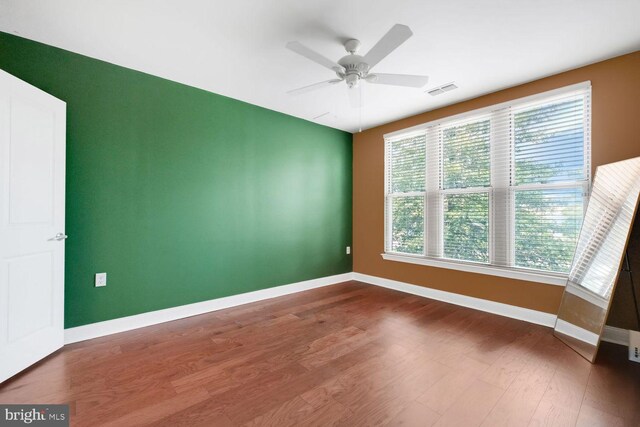 1391 Pennsylvania Ave SE Unit 247, Washington, DC 20003 - empty room with wood finished floors and a ceiling fan