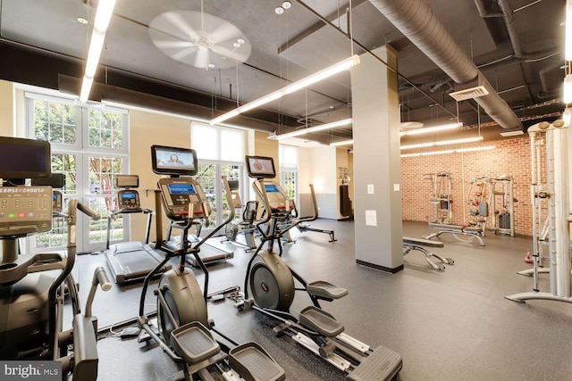 1391 Pennsylvania Ave SE Unit 247, Washington, DC 20003 - exercise room featuring brick wall and a ceiling fan