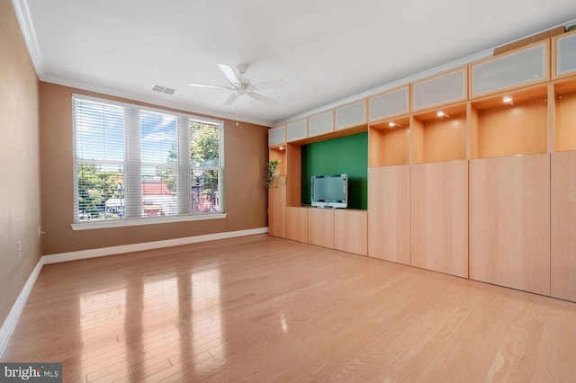 1391 Pennsylvania Ave SE Unit 247, Washington, DC 20003 - unfurnished living room featuring crown molding, light wood-type flooring, and ceiling fan